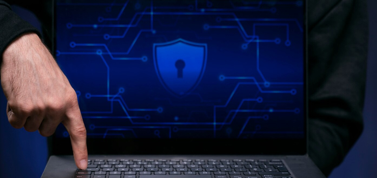 Close up finger typing on keyboard