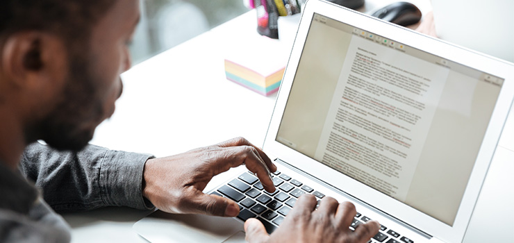 Laptop showing a document editor interface