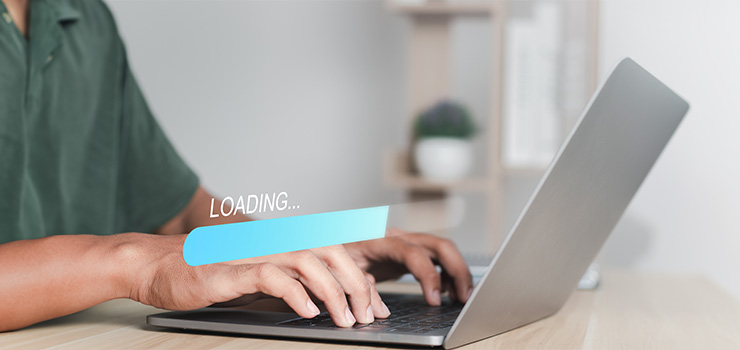 A laptop displaying loading bar