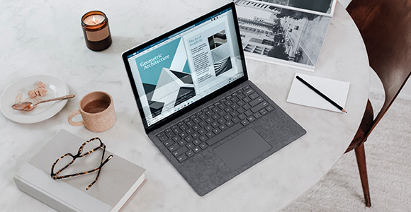 Laptop on a table with a document open